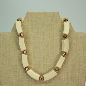 Vintage Napier cream Lucite necklace with gold tone beads